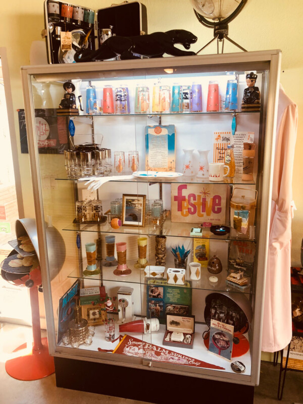 Glass case with vintage collections in Orbit In, a retro hotel in Palm Springs, CA Glass case with vintage collections in Orbit In, a retro hotel in Palm Springs, CA